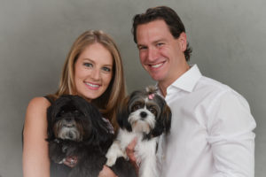 My husband and me with Oreo (left) and Millie (right).